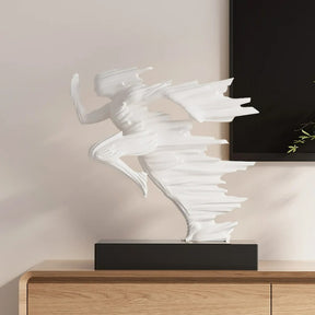 Escultura de homem correndo dourada